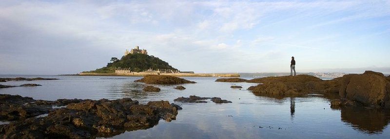 St. Michael’s Mount can be reached on foot at low tide, but otherwise only by ferry. It’s one of the big three tourist attractions on the remote peninsula of Cornwall. 

