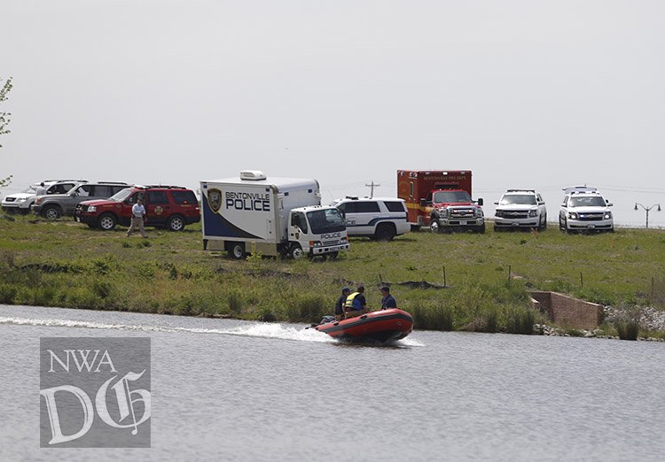 NWA Democrat-Gazette/JASON IVESTER The Bentonville Police Department is investigating a body found in Lake Bentonville. The body was pulled from the east side of the lake.