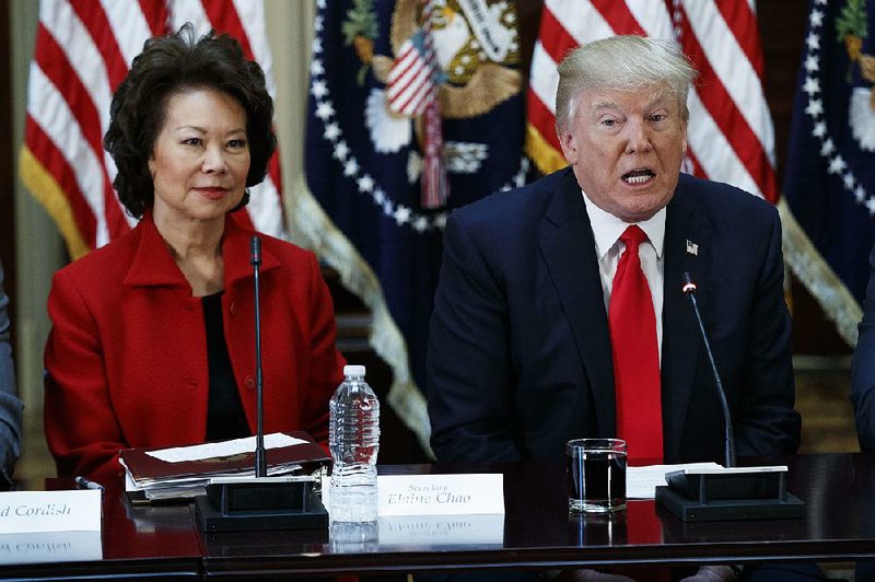 Transportation Secretary Elaine Chao and President Donald Trump hold talks with business leaders Tuesday.