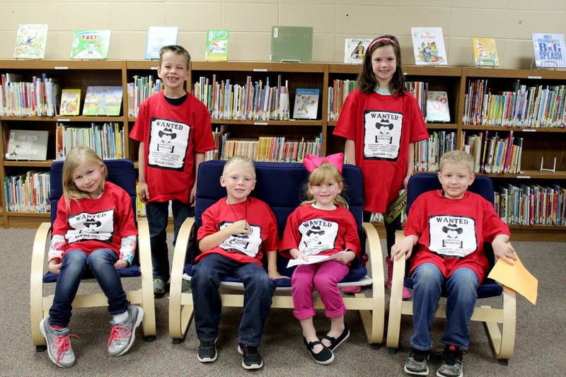 Submitted Photo &#8220;PAWsitive&#8221; and Wise Student (PAWS) award winners for the month at Glenn Duffy Elementary School were honored at the school&#8217;s April 3 assembly. PAWS Students of the Month for March, pictured wearing the T-shirts they received, are Aubree Fisher (left) of Sulphur Springs, Isaac Nichols of Bella Vista, Bryson McLauglin of Gravette, Rylea Daylong of Gravette, Ali Brown of Gravette and Brennon Hittson of Gravette.