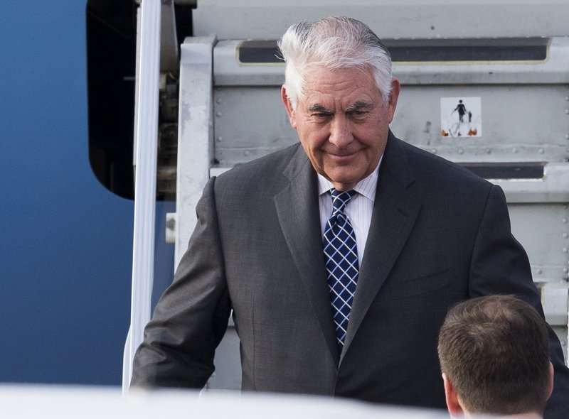US Secretary of State Rex Tillerson steps out of a plane upon arrival in Moscow's Vnukovo airport, Russia, Tuesday, April 11, 2017. Tillerson is due to meet with Russian Foreign Minister Sergey Lavrov on Wednesday. (AP Photo/ Ivan Sekretarev)