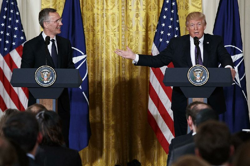 NATO Secretary-General Jens Stoltenberg and President Donald Trump hold a news conference Wednesday at the White House. Backtracking on past comments, Trump said NATO is “no longer obsolete” because of changes made after his criticism.