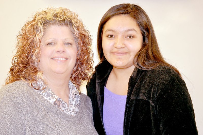 RACHEL DICKERSON/MCDONALD COUNTY PRESS McDonald County High School teacher Debbie Shaffer, left, is pictured with Juana Aquino, a student who spearheaded fundraising efforts to get Shaffer a machine she needed for medical reasons.