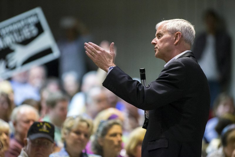 NWA Democrat-Gazette/JASON IVESTER Third District Rep. Steve Womack of Rogers speaks Thursday during a town hall meeting at Northwest Arkansas Community College in Bentonville.