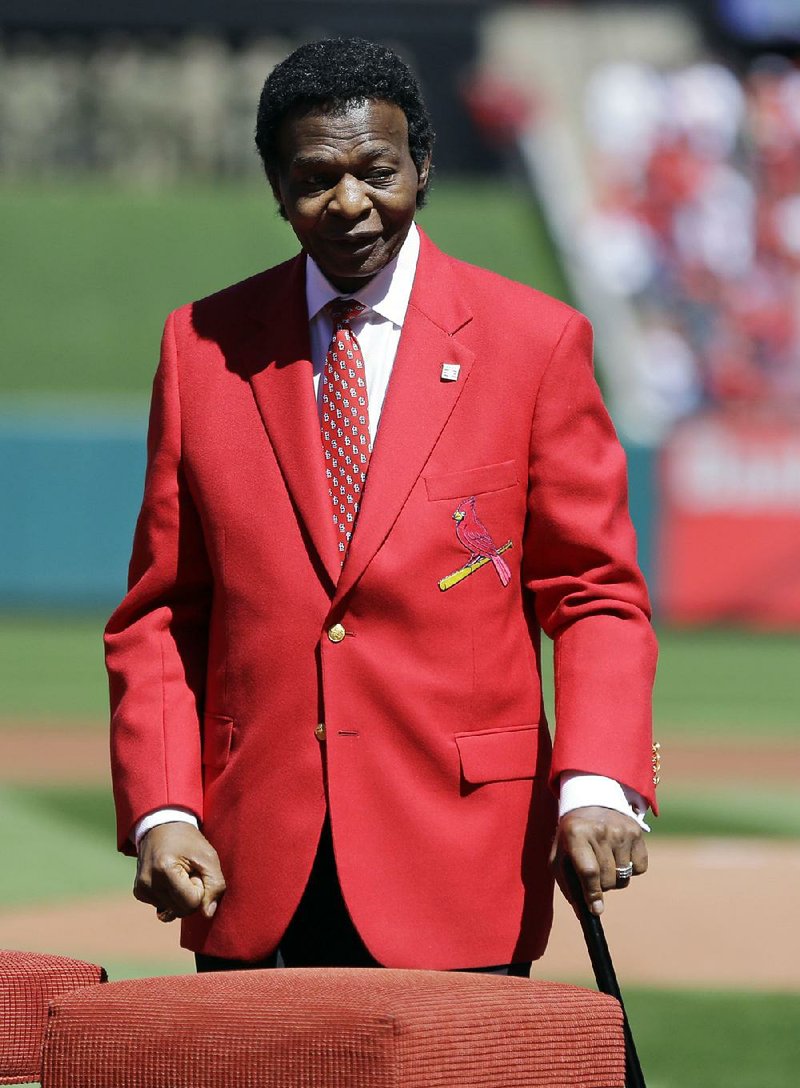 This April 11, 2017, file photo shows former St. Louis Cardinals great Lou Brock being introduced before the start a baseball game between the St. Louis Cardinals and the Milwaukee Brewers. 