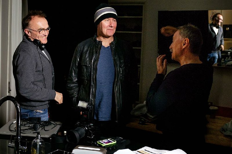 Director Danny Boyle, writer Irvine Welsh, and Robert Carlyle, who plays the character Begbie, are shown on the set of Boyle’s latest film T2 Trainspotting.