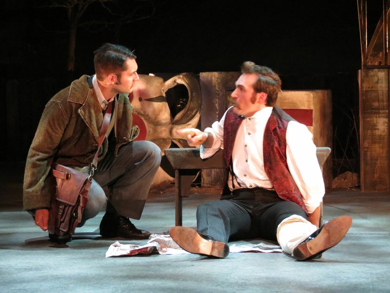 Landon Stocker as David Herold and Chandler Reid Evans as John Wilkes Booth rehearse for the University Theatre’s production of “Assassins.”