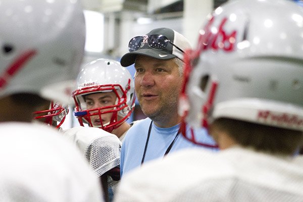 Fort Smith Southside coach Jeff Williams talks to his players prior to practice Thursday, Aug. 7, 2014. 