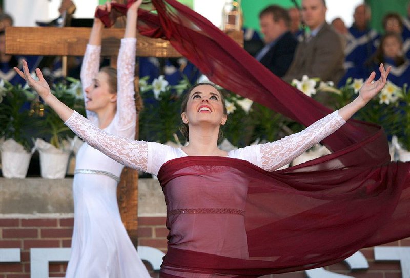 Erin Sanders (front) and Kathleen Marleneanu of New Creation Dance Company perform during the Community Easter Sunrise Service at First Security Amphitheater on March 27, 2016.