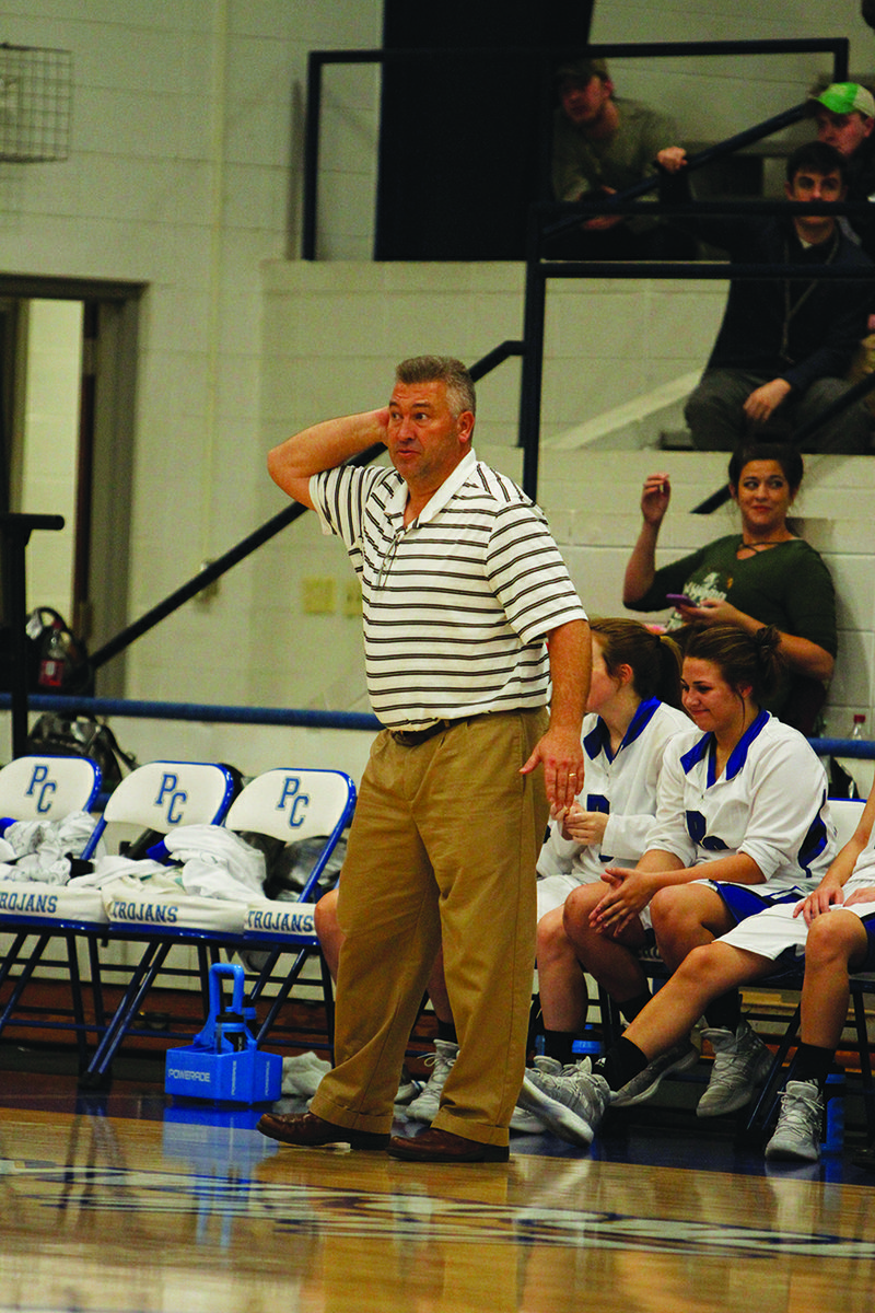Parkers Chapel coach Mark Young gives the signal for an offensive charge while on the sideline in a game against Nevada. Young, after 15 years as Parkers Chapel's girls basketball coach, recently took a football coaching job in Hampton.