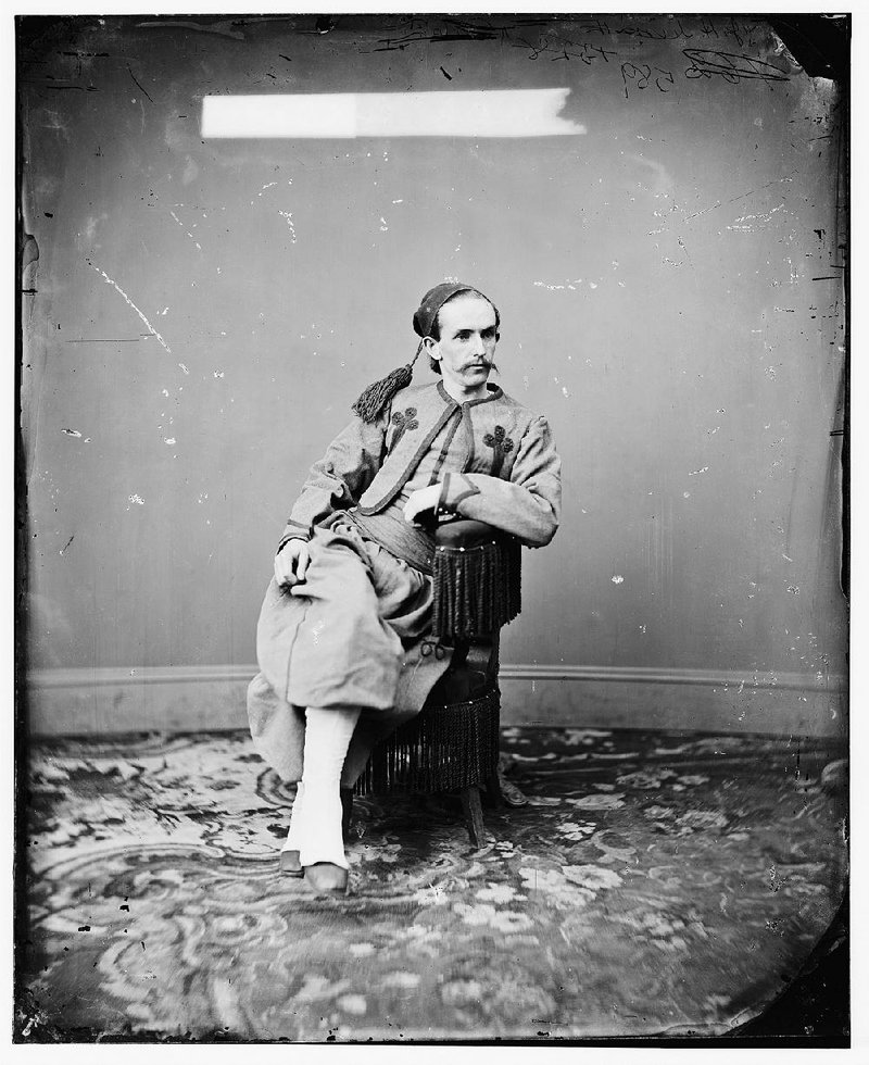 John Surratt poses in his uniform of the Papal Zouaves. He hid out in Italy under the name of Giovanni Watson, but was tracked down, only to escape in dramatic fashion before fi nally being caught, still wearing the uniform.