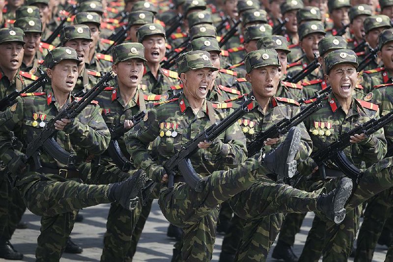 North Korean soldiers high-step across Pyongyang’s Kim Il Sung Square on Saturday in a parade celebrating the country’s founder and displaying an array of modern weaponry.