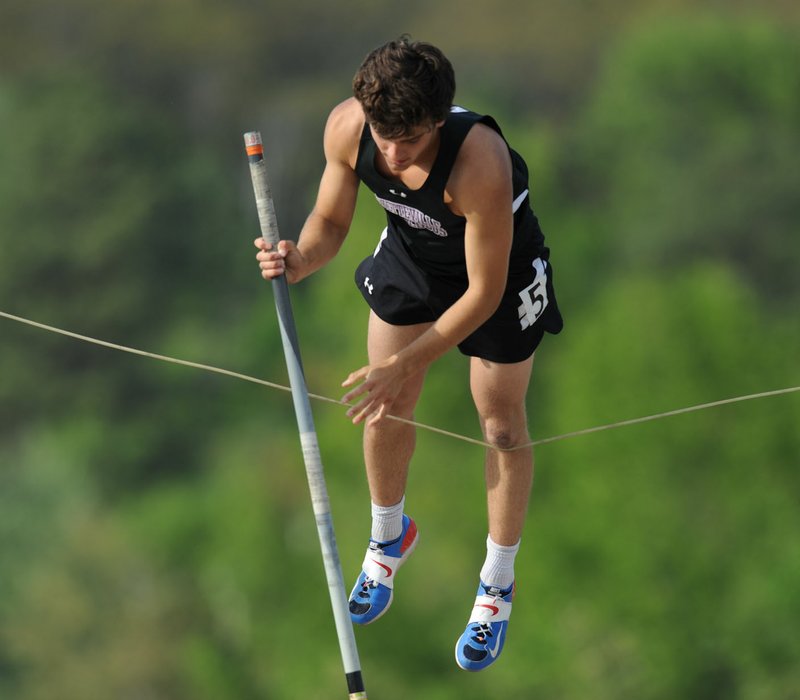 NWA Democrat-Gazette/ANDY SHUPE Fayetteville senior Hootie Hurley warms up Friday, April 14, 2017, for the pole vault during the Bulldog Relays at the Fayetteville High School outdoor track. Hurley signed a letter of intent to compete for Oklahoma State.