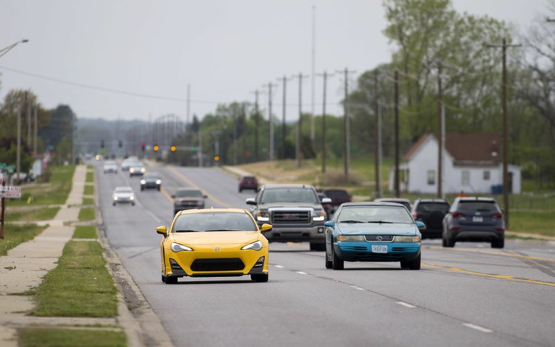 NWA Democrat-Gazette/JASON IVESTER Traffic moves Thursday along Southwest Regional Airport Boulevard in Bentonville.