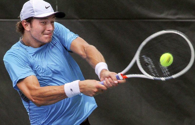 Canadian Brayden Schnur returns a shot in a straight-set victory over Philip Bester in the final of the Bolo Bash tennis tournament at Rebsamen Tennis Center on Sunday.