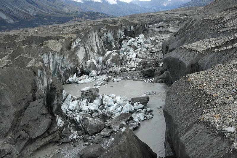 The ice-walled canyon at the terminus of the Kaskawulsh Glacier in northwestern Canada has rerouted most of the glacier’s melting water from one river to another.