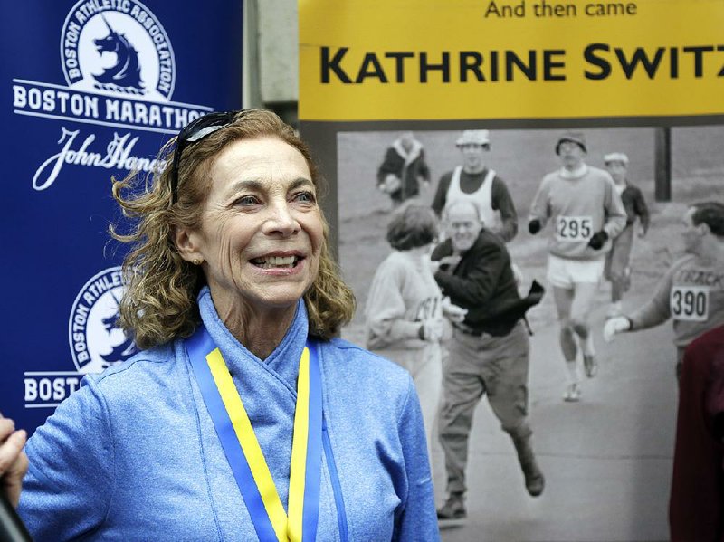 Kathrine Switzer, the first official woman entrant in the Boston Marathon 50 years ago, smiles during a news conference, Tuesday, April 18, 2017, in Boston, where her Bib No. 261 was retired in her honor by the Boston Athletic Association. 