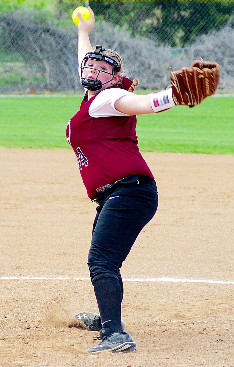 File Photo by Randy Moll Alyssa Kelton throws a pitch for the Lady Pioneers during a home game on Tuesday, April 4, 2017, against the Greenland Lady Pirates.