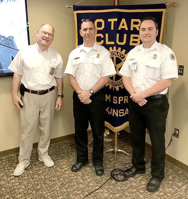 Photo submitted Jeremy Criner, Siloam Springs Fire Chief, and John Vanatta, Deputy Fire Chief, were the guest speakers to the Siloam Springs Rotary Club on April 4. They gave insight to the current training and anticipated upgrades in equipment coming to the department. Pictured from left, are Jim Grossardt, President-elect of the Rotary Club, Vanatta and Criner.