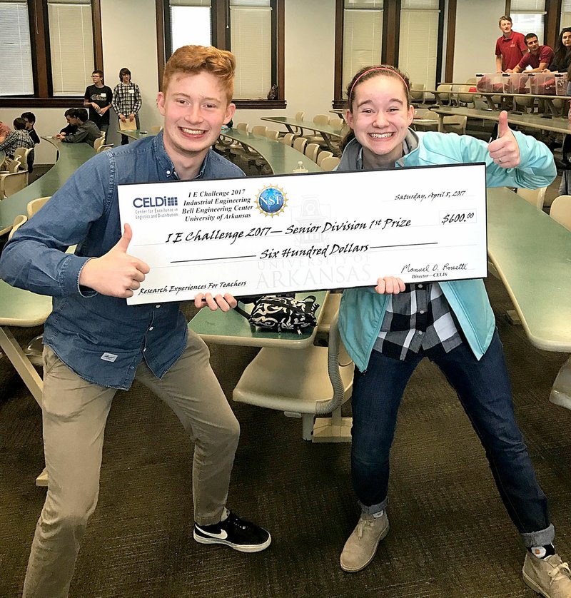 Photo submitted Moritz &#8220;Mo&#8221; Hayler and Caroline Dinger, both juniors at Siloam Springs High School, won first place in the Industrial Engineering Challenge 2017 on April 8. The students used the RollarCoaster Tycoon app to build a theme park, including elements such as layout, personnel management and financial success. The competition was sponsored by the Bell Engineering Center at the University of Arkansas.