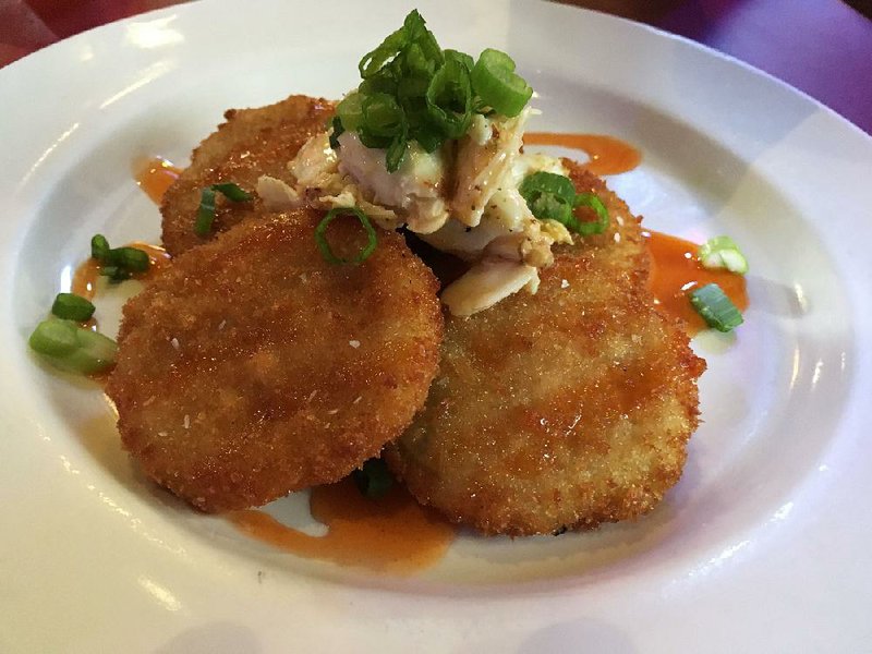 Fried Green Tomatoes with Crabmeat & Remoulade are a starter at Maddie’s Place. 