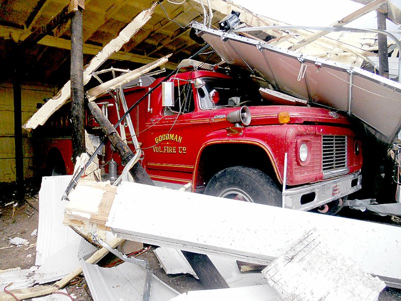 Photo submitted Firefighters with Goodman Fire Department have been working hard to dig out fire trucks buried in debris by the April 4 tornado that hit the town.