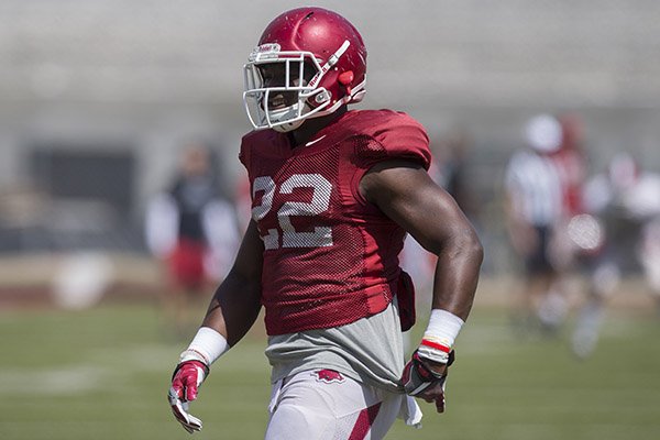 Arkansas running back Rawleigh Williams goes through warmups prior to practice Saturday, April 15, 2017, in Fayetteville. 