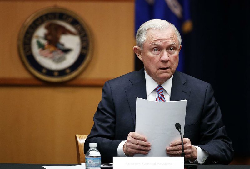 Attorney General Jeff Sessions prepares to speak before a meeting of the Attorney General's Organized Crime Council and Organized Crime Drug Enforcement Task Forces (OCDETF) Executive Committee to discuss implementation of the President's Executive Order 13773, at the Department of Justice, Tuesday, April 18, 2017, in Washington. 