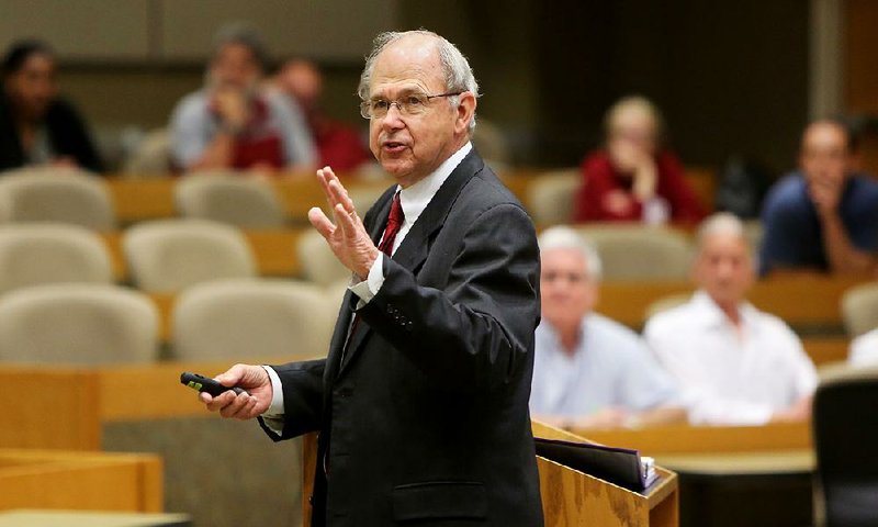 Former Arkansas Supreme Court Chief Justice Howard Brill speaks Thursday on ethics and the Arkansas Supreme Court in the E.J. Ball Courtroom on the campus of the University of Arkansas, Fayetteville.