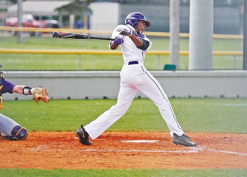 Terrance Armstard/News-Times El Dorado's Brennan Smith swings at a pitch during the Wildcats' contest against Ashdown on Thursday. The Wildcats overcame a 6-2 deficit to top the Panthers 7-6 in eight innings.