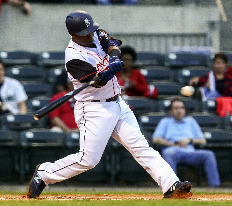 Jean Segura flies out for the Arkansas Travelers during the first inning of Friday night’s game at Dickey-Stephens Park in North Little Rock. Segura, the shortstop for the Seattle Mariners, is with the Travelers for a three-day rehab assignment.
