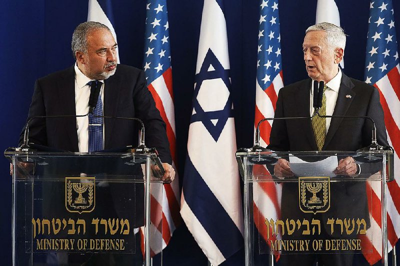 U.S. Defense Secretary James Mattis (right) and Israeli Defense Minister Avigdor Lieberman hold news conference Friday in Tel Aviv, where Mattis said there’s “no doubt” Syria still has chemical weapons.