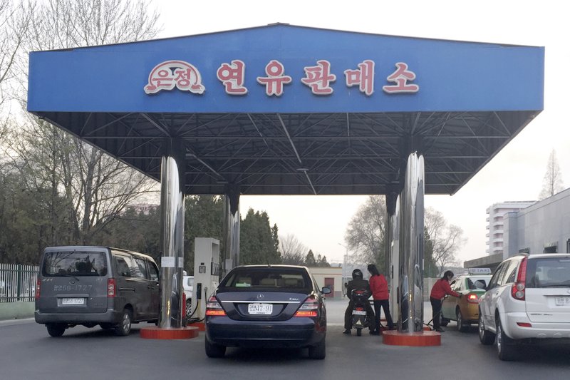 FILE - In this April 1, 2016, photo, cars line up at at a gas station in Pyongyang, North Korea. Car users in Pyongyang are scrambling to fill up their tanks as gas stations limit services and close their gates amid concerns of a possible shortage. The cause of the restrictions or how long they might last were not immediately known. 