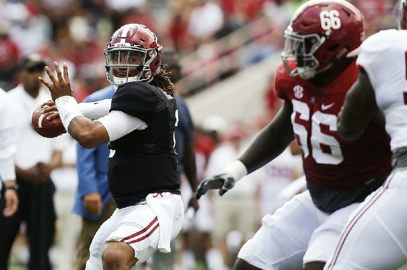 Alabama quarterback Jalen Hurts, who struggled late last season in the passing game, threw for 301 yards and 2 touchdowns in the Crimson Tide’s spring game Saturday