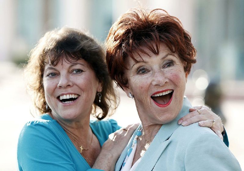  In this June 18, 2009 file photo, actresses Erin Moran, left, and Marion Ross pose together at the Academy of Television Arts and Sciences' "A Father's Day Salute to TV Dads" in the North Hollywood section of Los Angeles. Moran, the former child star who played Joanie Cunningham in the sitcoms "Happy Days" and "Joanie Loves Chachi," has died at age 56. 