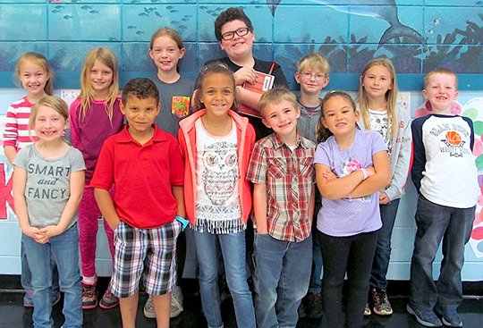 Submitted photo Magnet Cove Elementary School recently announced the March Students of the Month. Students were front, from left, Gracie Schaefer, Joey Conklin, Taysia Buckley, Ethan Lecroy and Ashanti Johnson, and back, from left, Samantha Shepherd, Madison Schlosser, Abby Jo McClaran, Aaron Holland, Davien Yingling, Cheylynn McClard and Will Kizzia.