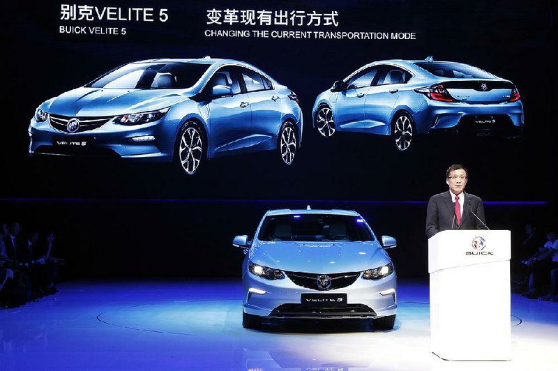 SAIC-GM President Wang Yongping announces the global launch of the Buick Velite 5, an extendedrange electric hybrid, during an event last week ahead of the Shanghai auto show.