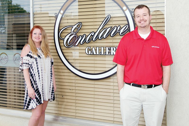 Shelby McFarland, marketing coordinator/personal relations for CASA of Saline County, and Josh Patterson, the showcase sponsor for the 20 for 20 Mixer, visit the The Enclave Gallery at White Furniture, 112 E. Ashely St. in Benton, where the mixer will take place from 6-9 p.m. Thursday. 