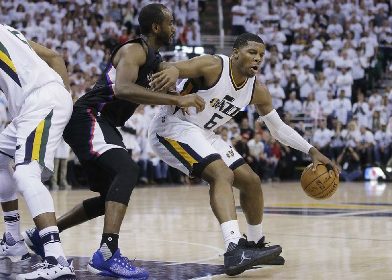 Utah forward Joe Johnson (right) is one of several veterans who have stepped up during this season’s NBA playoffs. The former Little Rock Central and Arkansas Razorbacks standout is averaging 19.3 points over the first four games of the Jazz’s Western Conference first-round series against the Los Angeles Clippers, including a 28-point effort in their 105-98 victory Sunday.