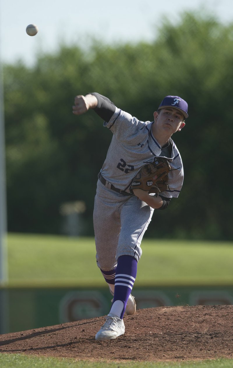 Miller Pleimann (22) of Fayetteville pitches against Springdale Monday, April 24, 2017 at Bob Lyall Field in Springdale. The Purple Dogs won 3-2.