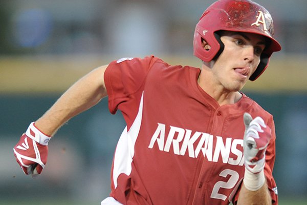 Arkansas second baseman Carson Shaddy rounds the bases on his way to the plate against Memphis Tuesday, April 18, 2017, after center fielder Dominic Fletcher hit a three-run triple during the third inning at Baum Stadium.