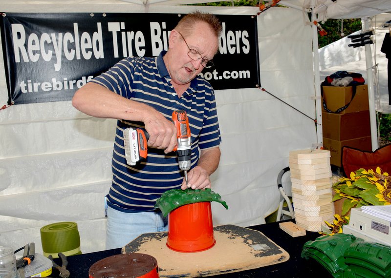 File Photo Dean Henry assembled a birdhouse out of recycled materials during a previous Dogwood Festival.