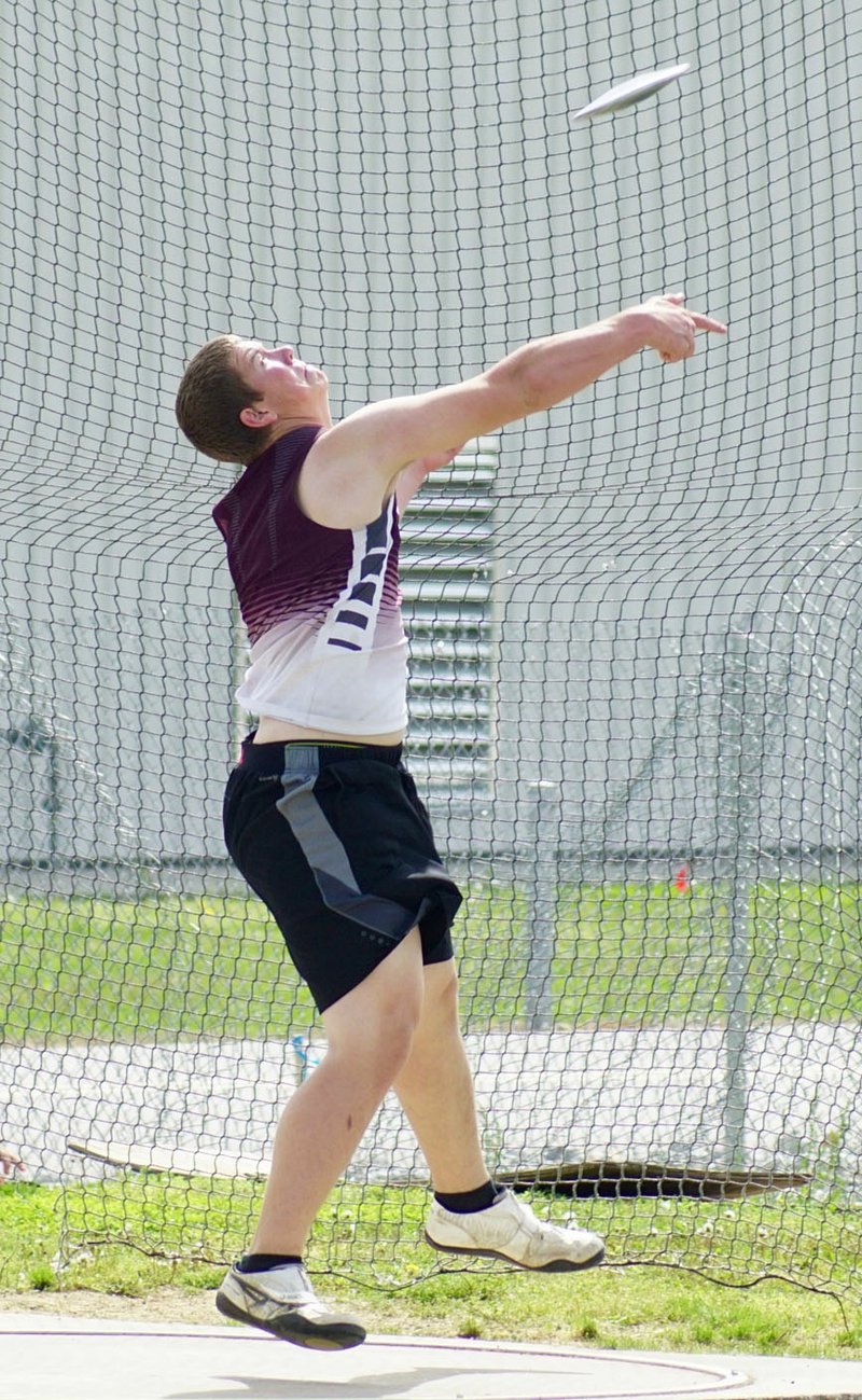 File photo by Randy Moll Gentry&#8217;s Mason Clark throws the discus during the Pioneer Relays held in Gentry on Thursday, April 13, 2017. Clark took first in the event with a throw of 123 feet, six inches.