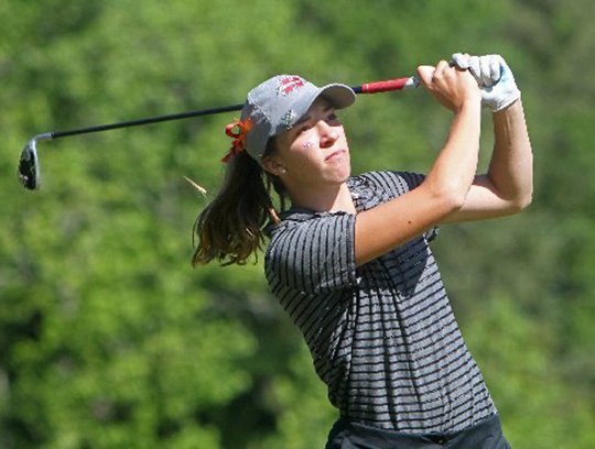  The Sentinel-Record/Richard Rasmussen IN FLIGHT: Henderson State golfer Hanna Braubarger watches her drive off No. 3 on the Park course in the Great American Conference women's tournament at Hot Springs Country Club. Braubarger tied for ninth at 233 and the Reddies finished second, four strokes behind repeat winner Arkansas Tech.