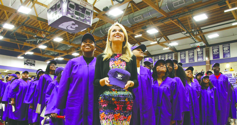 Signing Day: Miss America 2017 Savvy Shields stands alongside hundreds of El Dorado High School seniors in Wildcat Arena during the 11th annual EHS Academic Signing Day on Wednesday. Shields delivered the keynote address for the event, which honors students receiving the El Dorado Promise Scholarship. See 6A for more photos. 
