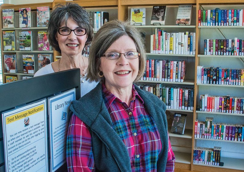 The El Paso Community Library is open for business at 1607 Ridge Road in a restored building that was once a bank. Judy Riley, right, is one of the community leaders of the restoration effort, and Janet Blansett is the librarian at the library, which is part of the White County Regional Library System.