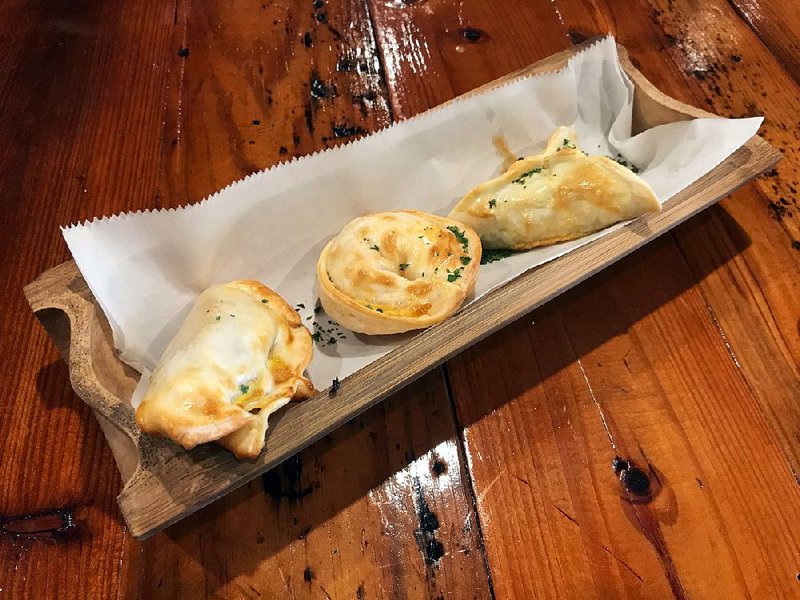 A trio of empanadas, with their flaky, pastrylike crust, is a perfect intro to the Argentinian food at Buenos Aires. 