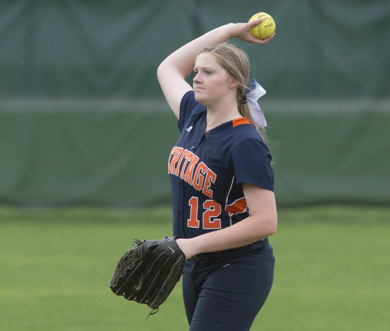 NWA Democrat-Gazette/ANTHONY REYES @NWATONYR Sarah Pollock of Rogers Heritage has been a key part of the Lady War Eagles team in the circle and at the plate.