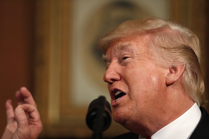 President Donald Trump speaks at the Interior Department in Washington, Wednesday, April 26, 2017, before signing an Antiquities Executive Order. The president is asking for a review of the designation of tens of millions of acres of land as &quot;national monuments.&quot; (AP Photo/Carolyn Kaster)