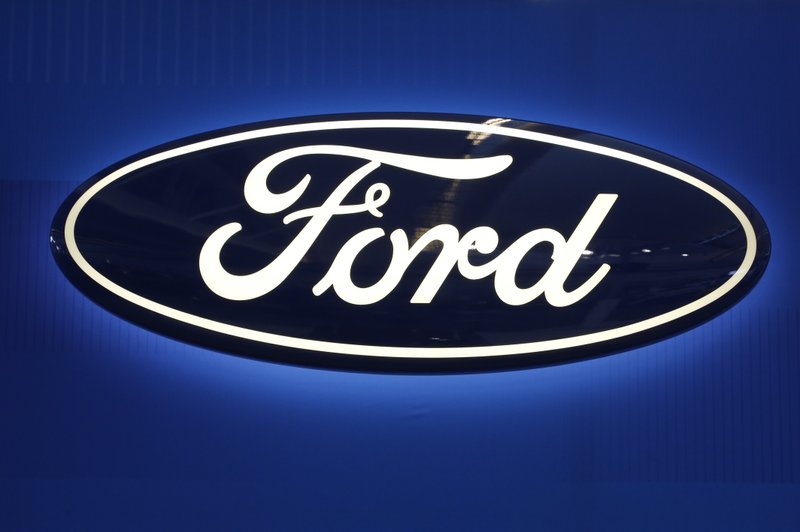 FILE - This Feb. 11, 2016, file photo shows the Ford logo on display at the Pittsburgh International Auto Show in Pittsburgh. Ford Motor Co.&#x2019;s net income fell 35 percent to $1.6 billion in the first quarter reported Thursday, April 27, 2017, as it was hit by costly recalls, lower sales and rising prices for steel and other materials. (AP Photo/Gene J. Puskar, File)